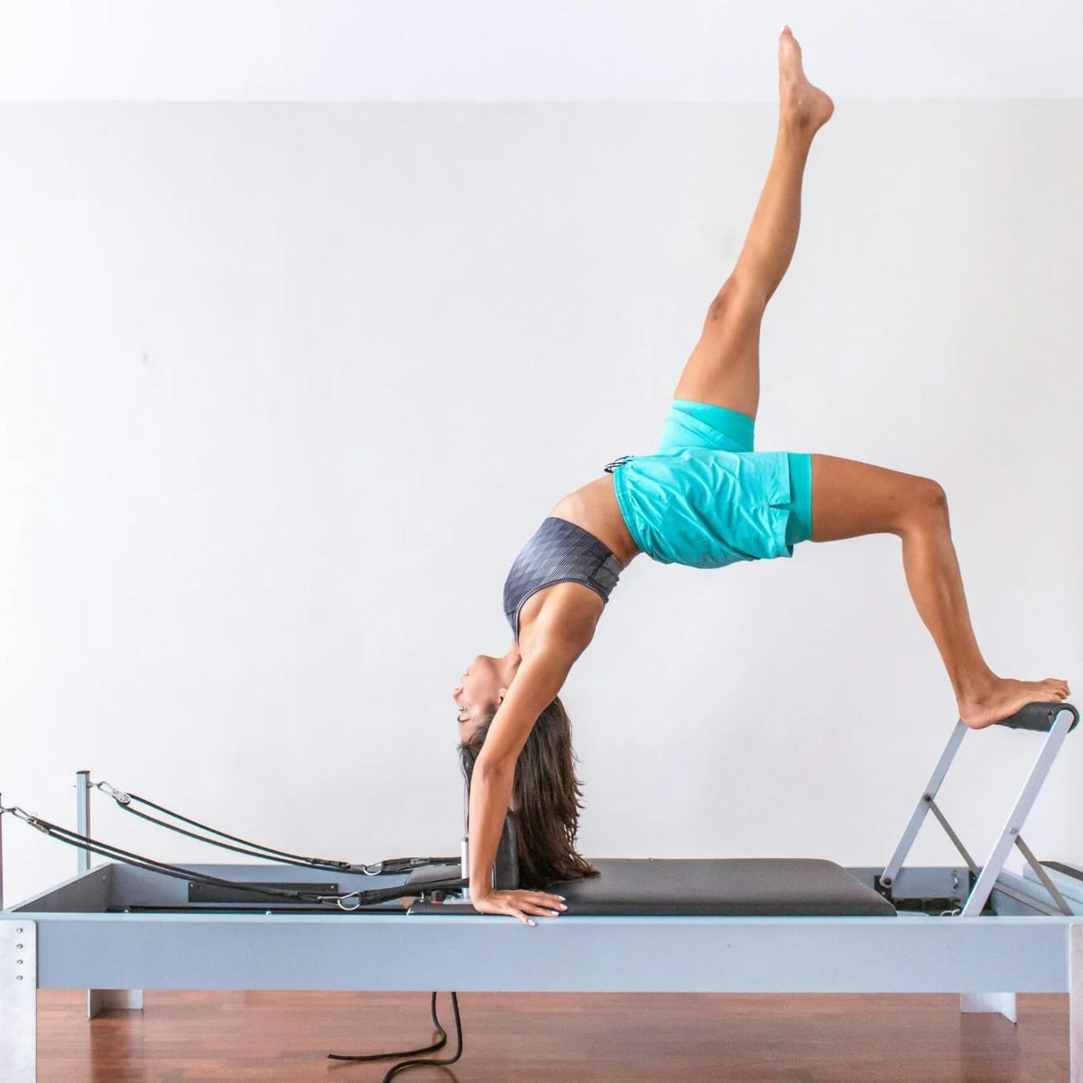 Exploring the Differences Between Mat and Reformer Pilates for Optimal ...